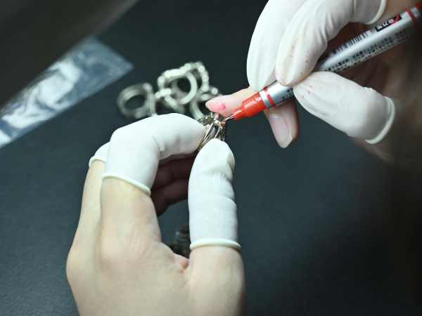 Inspecting-the-sterling-silver-rings