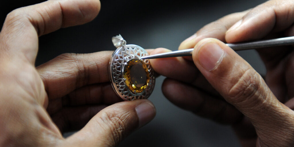 Handmade jewelry being made